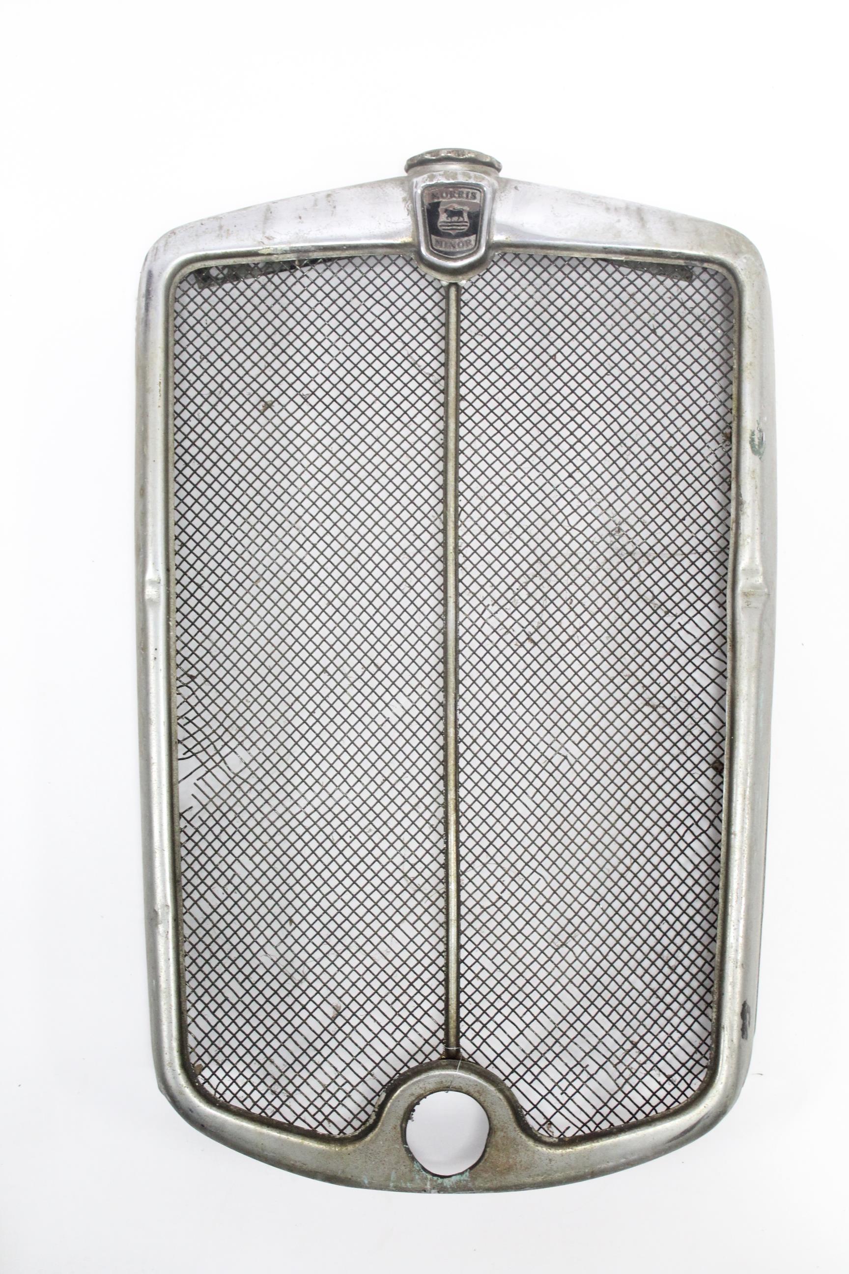 A chrome grille from a vintage “Morris Minor” motor car.