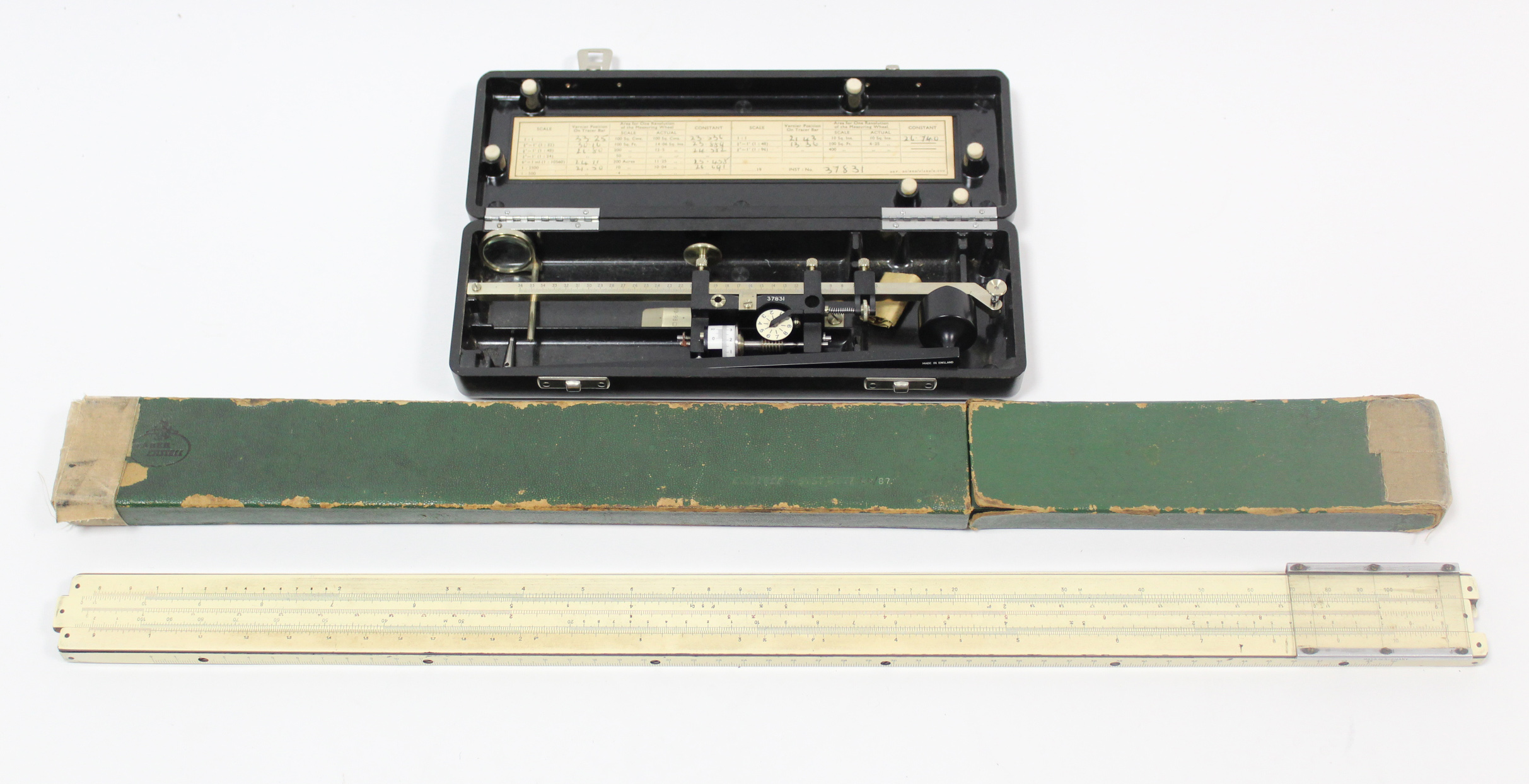 A 1940’s Allbrit planmeter (No. 37831), in black Bakelite case; & a slide rule with cardboard case.