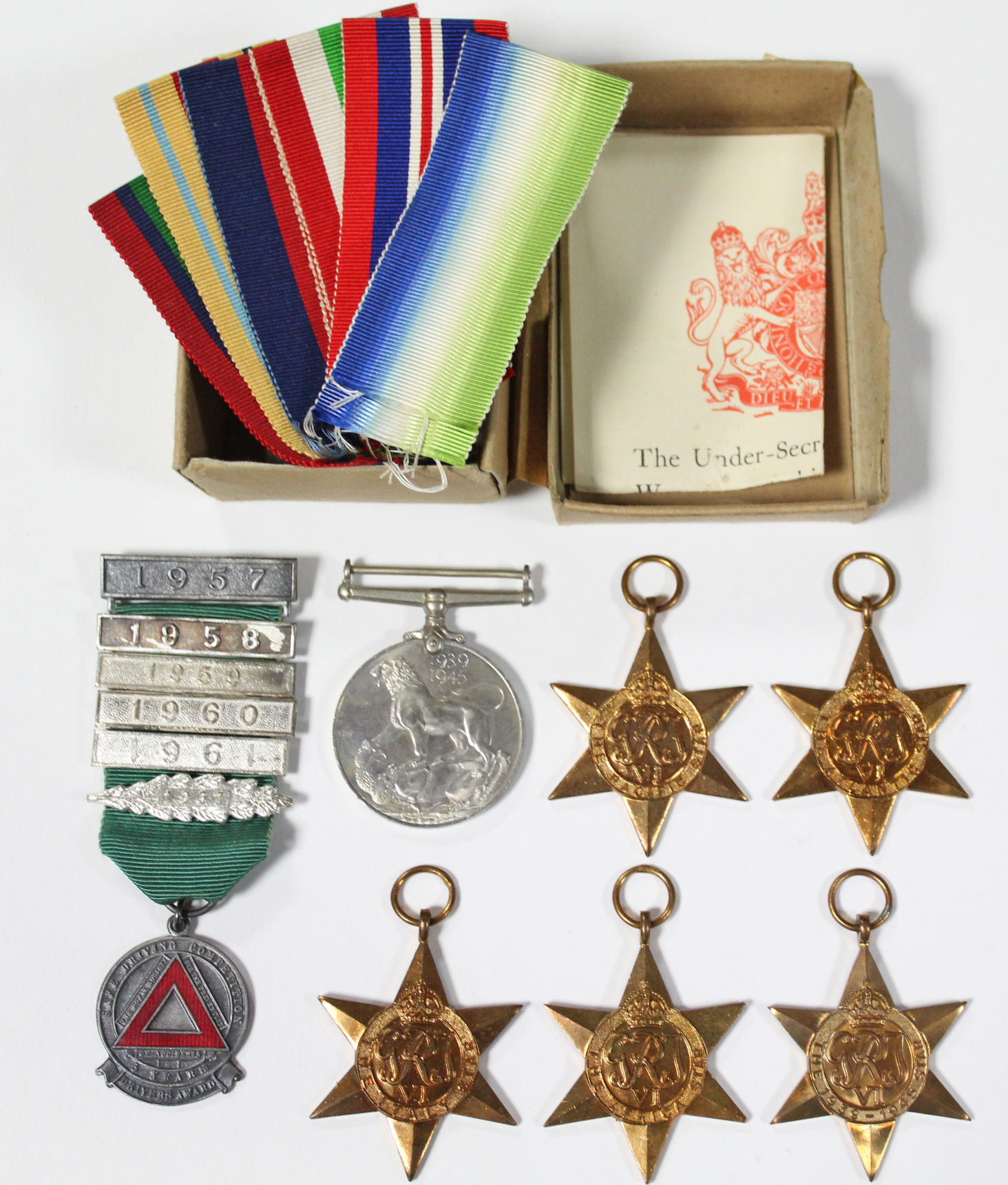 A group of six WWII medals: 1939-45 Star, Atlantic Star, Africa Star, Pacific Star, Italy Star, &