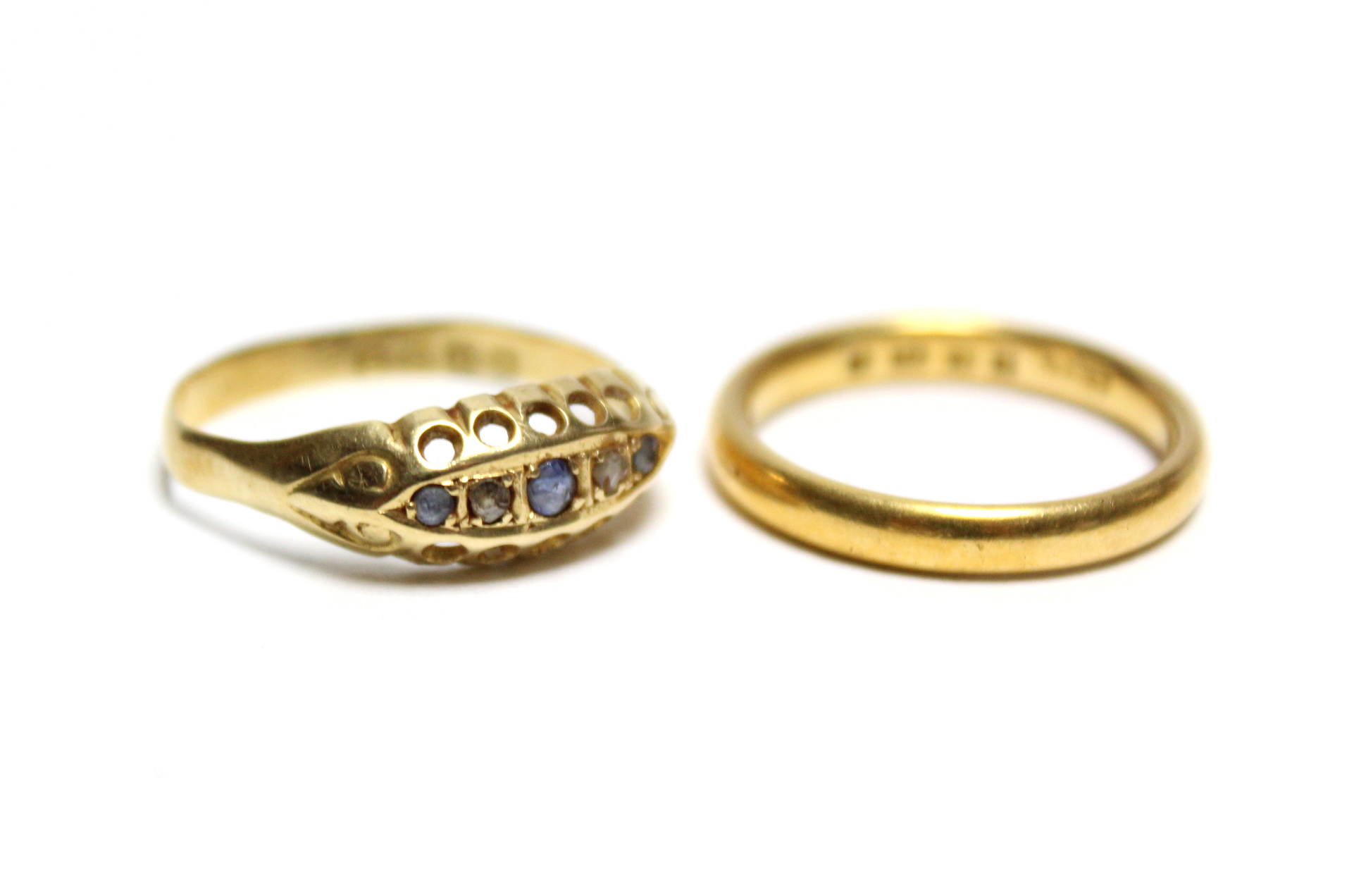 A 22ct gold wedding band; & an 18ct gold ring inset five precious stones - Image 2 of 4