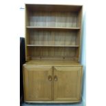 An Ercol light elm living room unit,