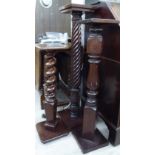 Three dissimilar late 19th/early 20thC mahogany torcheres, on square platforms 31'',