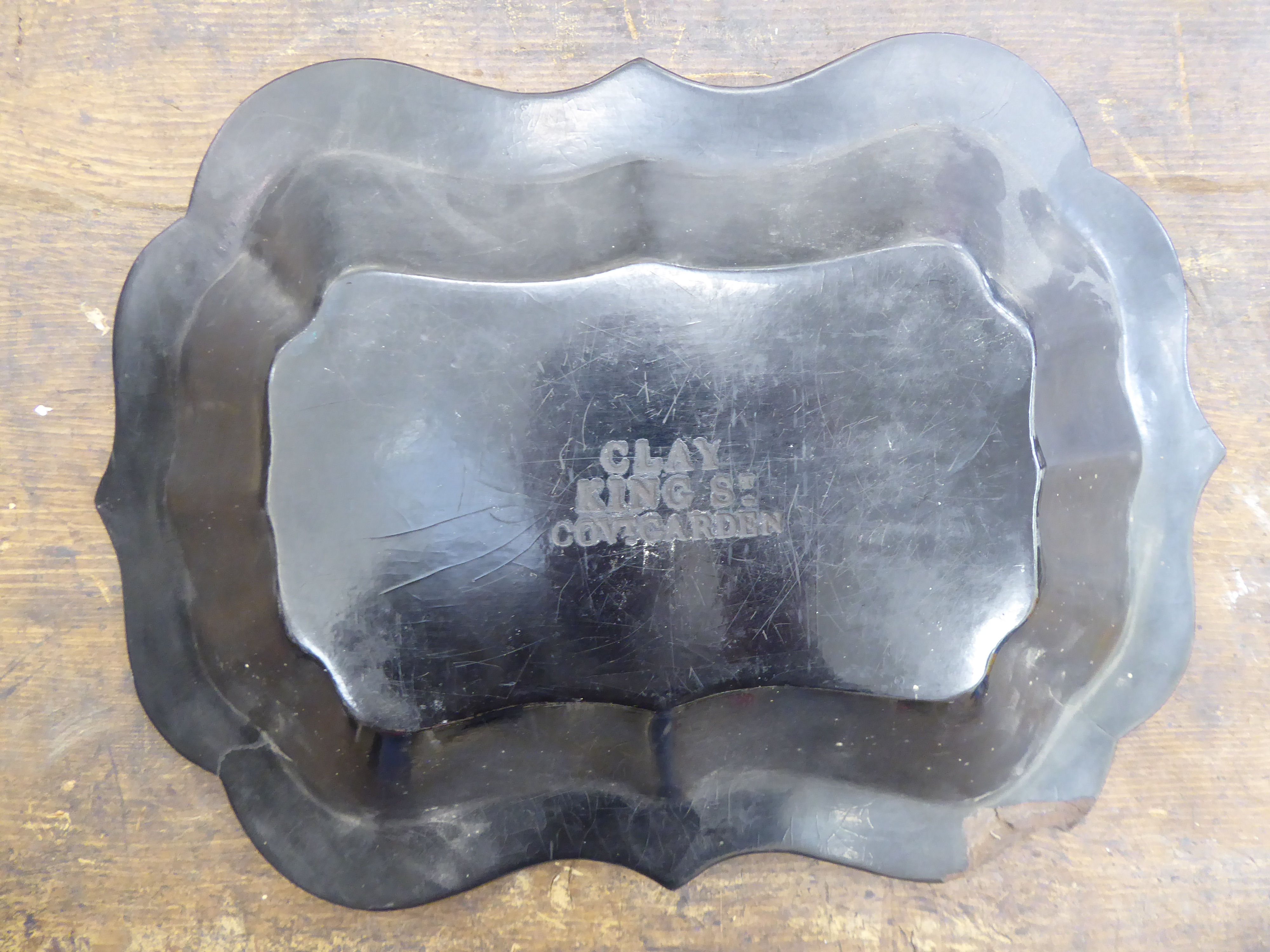 A late Victorian black lacquered papier mache dish of oval, segmented and lobed form, - Image 2 of 3
