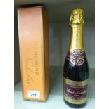 A half bottle of Saint Nicholas champagne boxed OS5