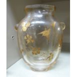 A 20thC glass vase of lobed baluster form,