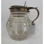 A 19thC silver capped glass condiments jar with a scrolled handle London marks rubbed 11