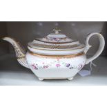 An early 19thC Derby china teapot of oval, ogee form, decorated with rose garlands,