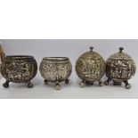 A late 19th/early 20thC Asian four piece white metal condiments set of spherical form,
