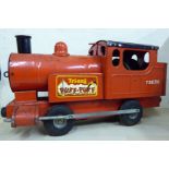 A Tri-ang red and black tinplate model Puff-Puff toy railway locomotive with rubber wheels