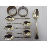 A set of five silver apostle design coffee spoons,
