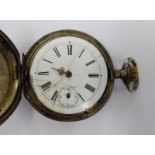 A late 19thC French slim, white metal cased full hunter pocket watch,