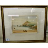 F Stowell - a shoreline scene with two beached rowing boats in the foreground watercolour bears a