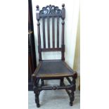 A mid 19thC oak framed, high back side chair with a scroll carved crest and moulded lath back,