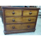 A late Victorian mahogany dressing chest, comprising two short/two long drawers,