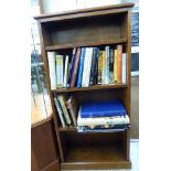 A modern oak open front bookcase with three shelves,