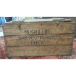 A 1940s planked pine crate with rope flank handles and a hinged lid,