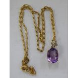 A 9ct gold amethyst and diamond pendant necklace 11