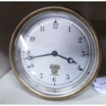 A mid 20thC Smiths of London brass cased instrument panel timepiece;