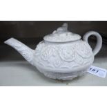 An early 19thC Wedgwood ivory glazed and moulded stoneware small, round teapot,