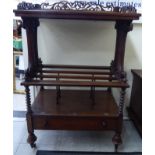 A late Victorian rosewood Canterbury/what-not, the top with a pierced, scrolled gallery,