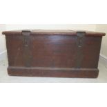 A late 19thC Colonial boarded hardwood chest with iron strap reinforcement and a pair of integral