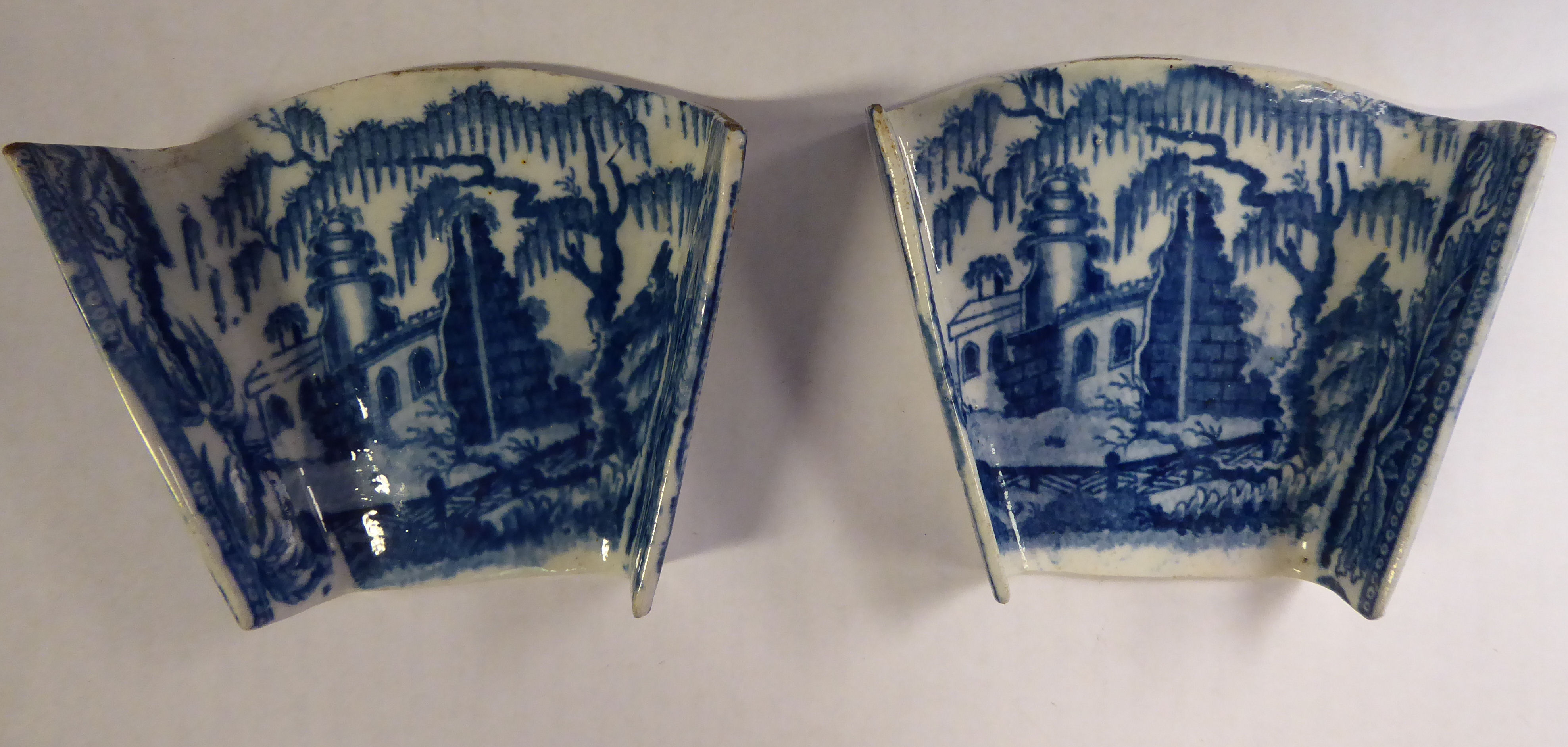 A pair of late 18thC porcelain asparagus servers,