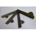 A mid 19thC folding cast steel and brass blood letting fleam