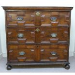 An early 18thC walnut and oak block front dressing chest,
