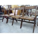 A 1920s light oak framed row of four conjoined,