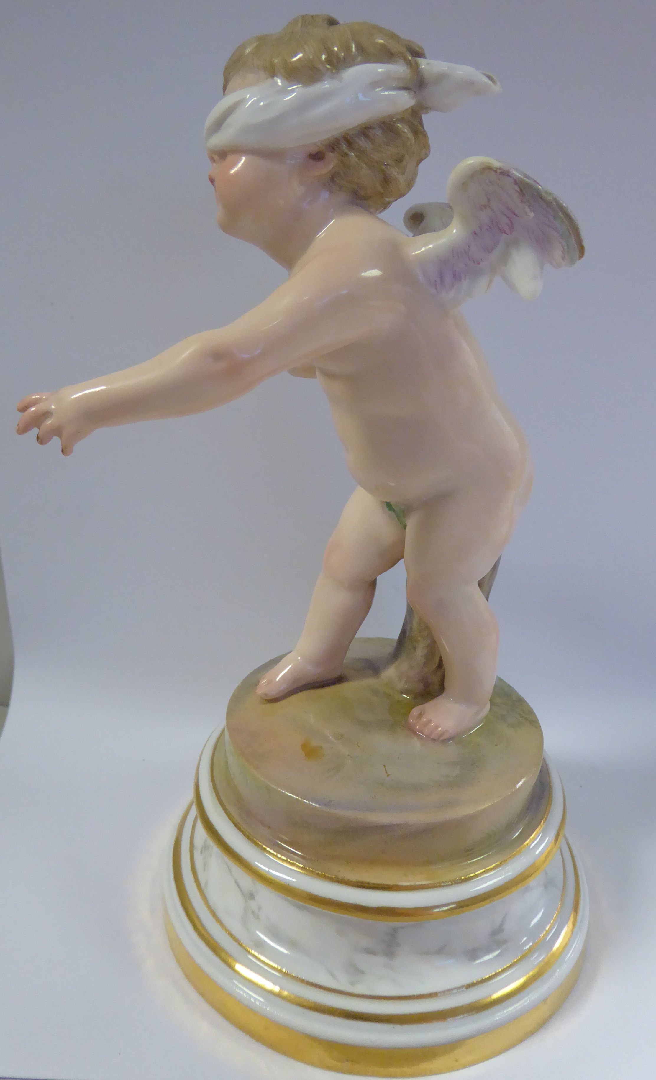 A Meissen porcelain figure 'Cupid Blindfolded' on a gilded, - Image 2 of 6