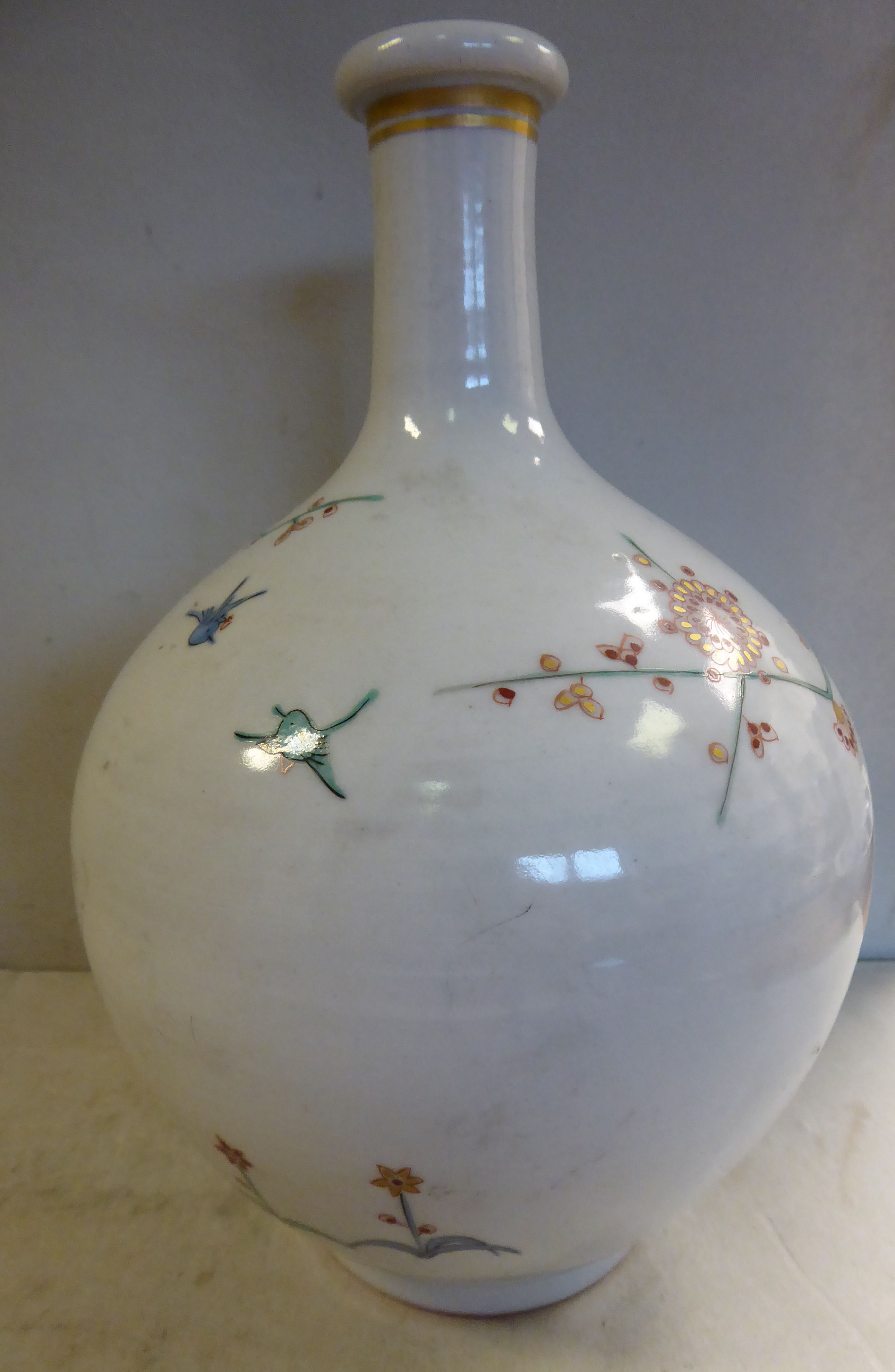 A late 19th/early 20thC Japanese porcelain bottle vase of ovoid form, the short, - Image 3 of 6