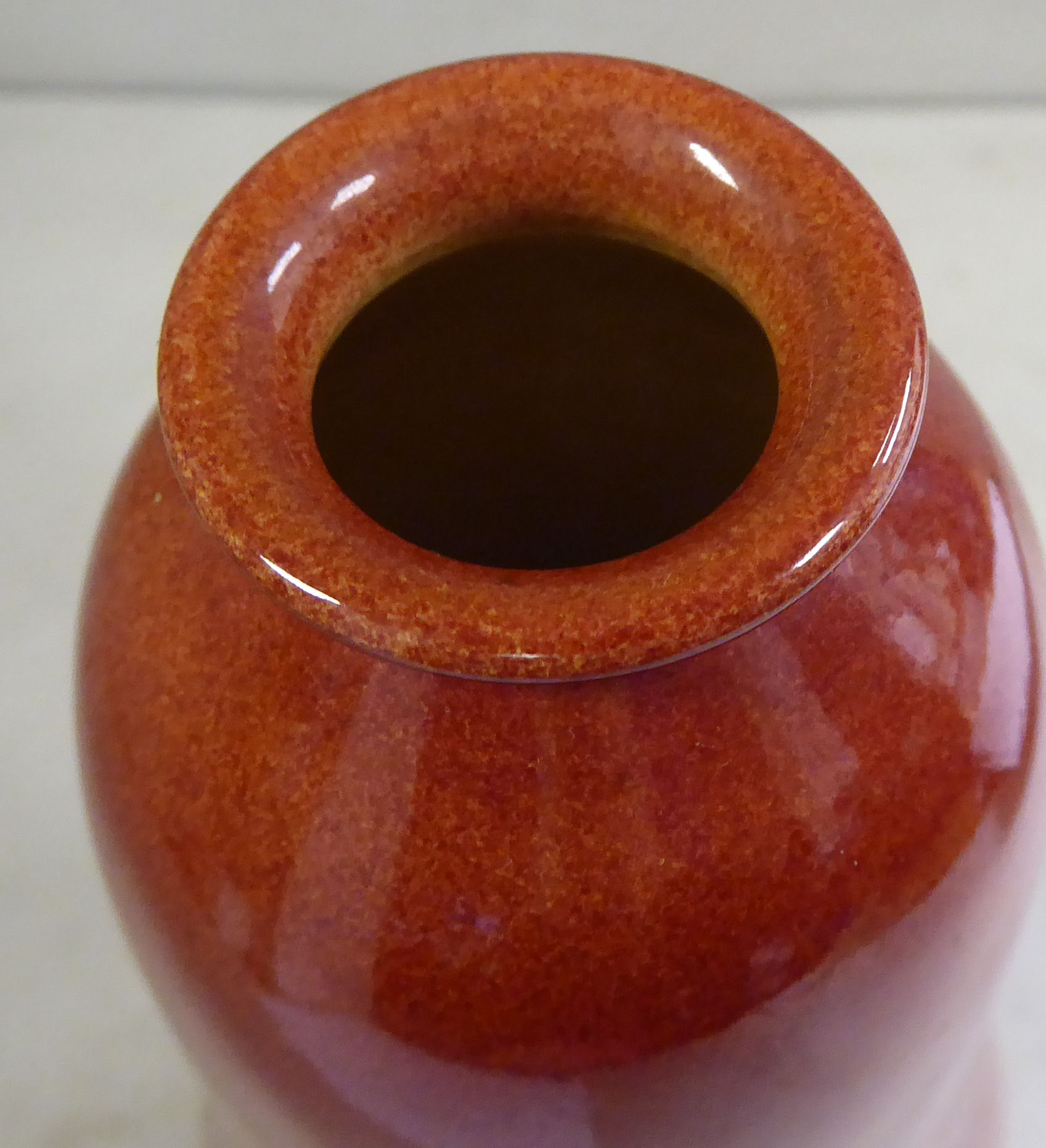 A Pilkingtons Royal Lancastrian sponged iron red glazed pottery vase of gourd form with a narrow - Image 2 of 3