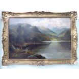 FE Jamieson - a highland loch scene oil on canvas bears a signature 20'' x 29'' framed