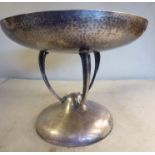 An Edwardian Art Nouveau inspired, spot-hammered silver shallow pedestal bowl,