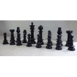 An early 20thC St. George pattern turned and carved boxwood and ebony chess set Kings 4.