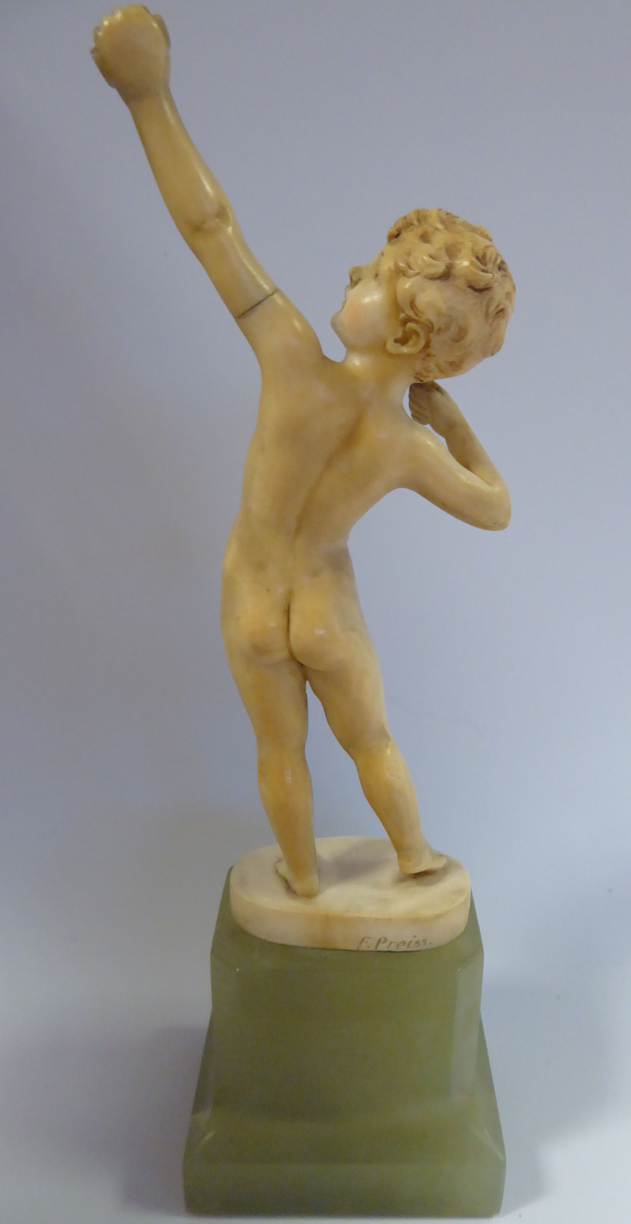 F Prieiss - 'The Archer' a carved ivory figure, (bow missing) bears a signature, - Image 3 of 7