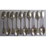 A mid Victorian set of ten silver fiddle and shell pattern teaspoons John James Whiting London