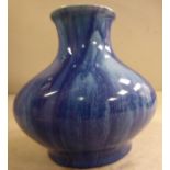 A Royal Lancastrian streaky blue drip glazed pottery vase of squat,