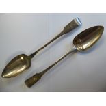 A pair of George IV Irish silver fiddle pattern basting spoons Henry Gardner Dublin 1821