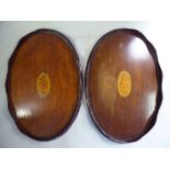 A pair of Edwardian mahogany (possibly a trader's samples), oval, wavy, galleried trays 7.