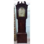 A late 19thC mahogany cased wall timepiece with a turned surround;