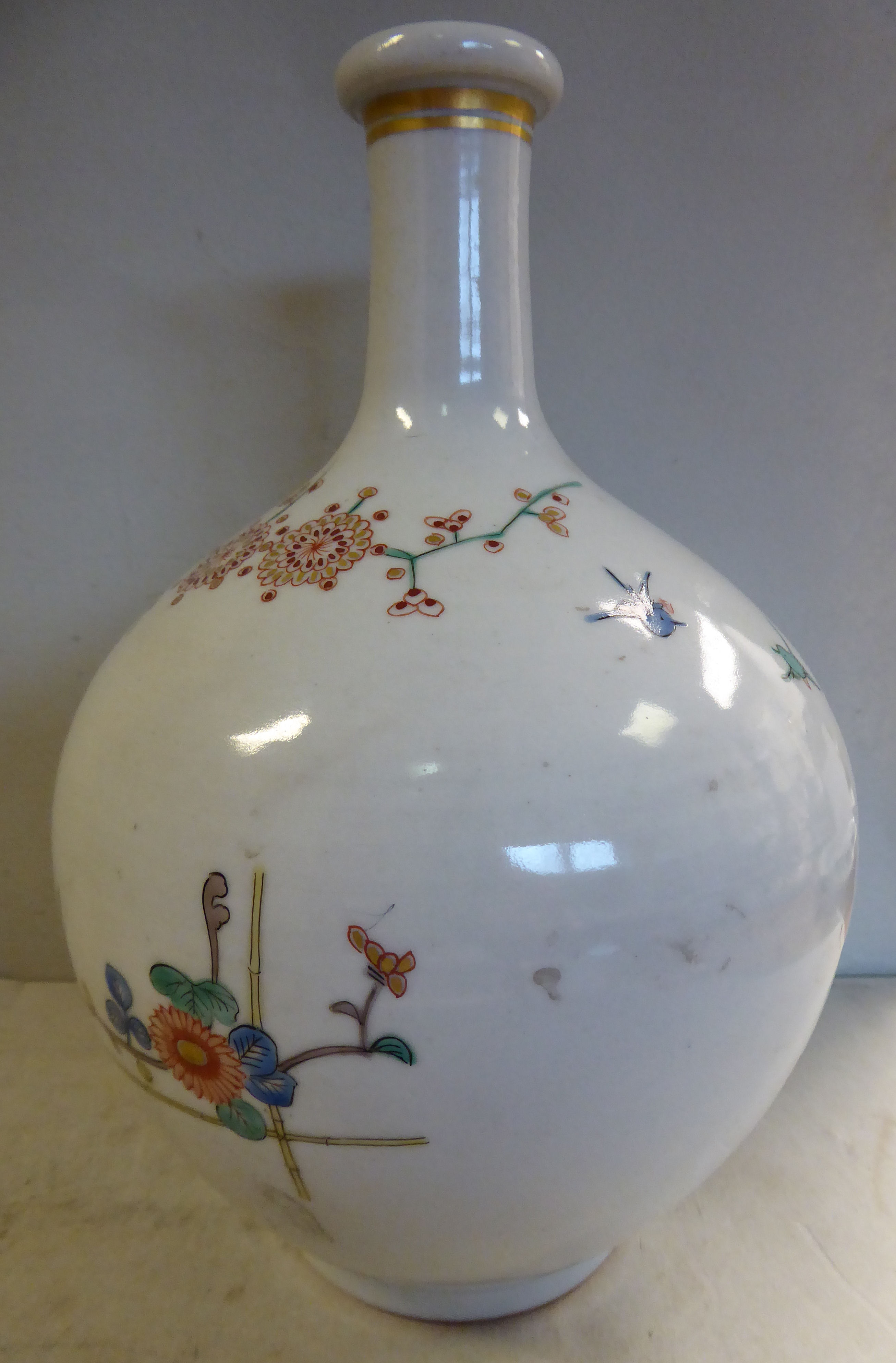 A late 19th/early 20thC Japanese porcelain bottle vase of ovoid form, the short, - Image 2 of 6