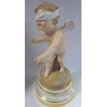 A Meissen porcelain figure 'Cupid Blindfolded' on a gilded,
