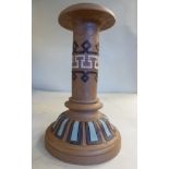 A late 19thC Doulton Lambeth Silicone stoneware candlestick with a wide sconce and a cylindrical