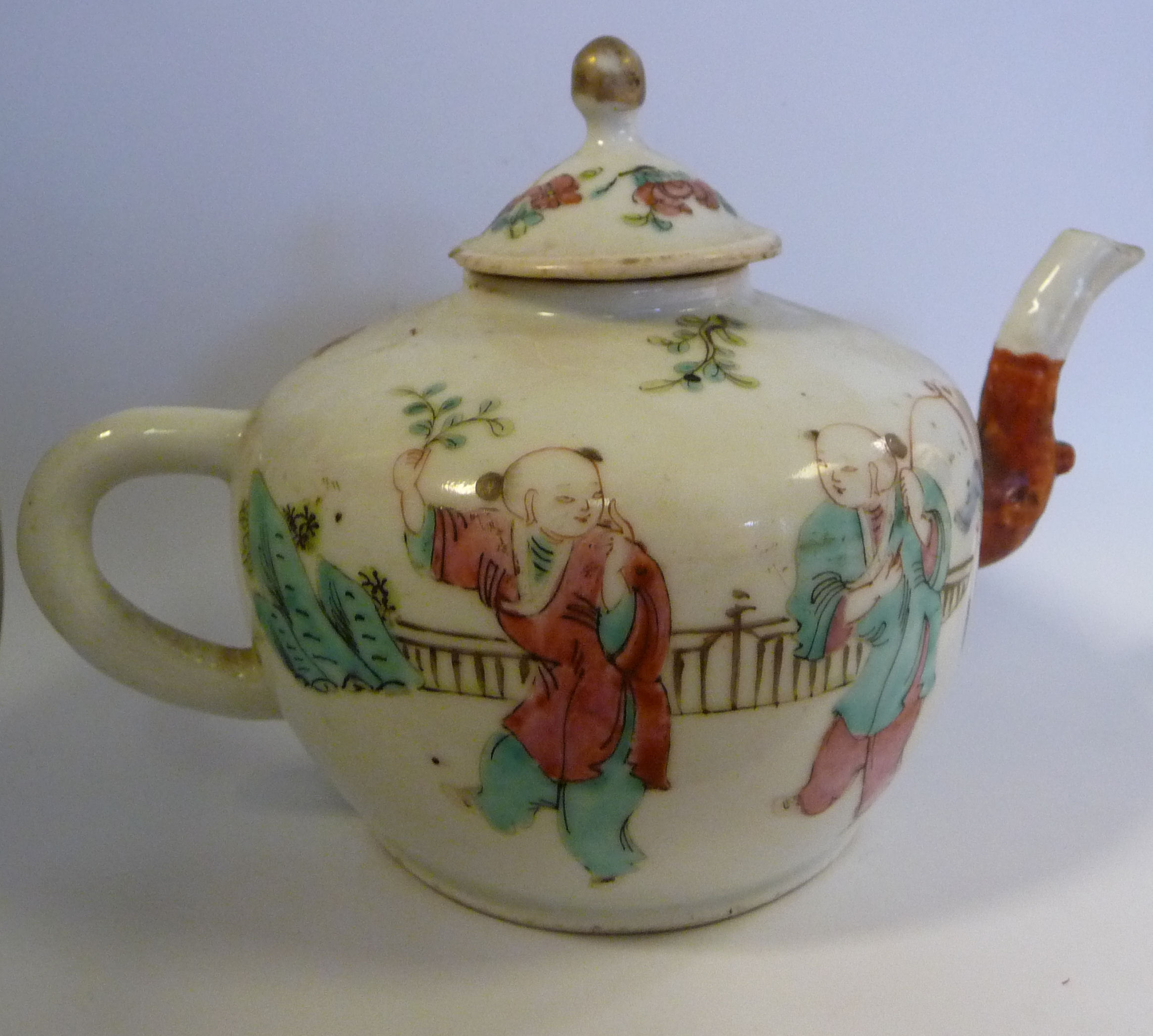 A late 18thC Chinese porcelain small, round teapot and lid,