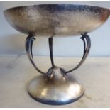 An Art Nouveau inspired, spot-hammered silver shallow pedestal bowl,