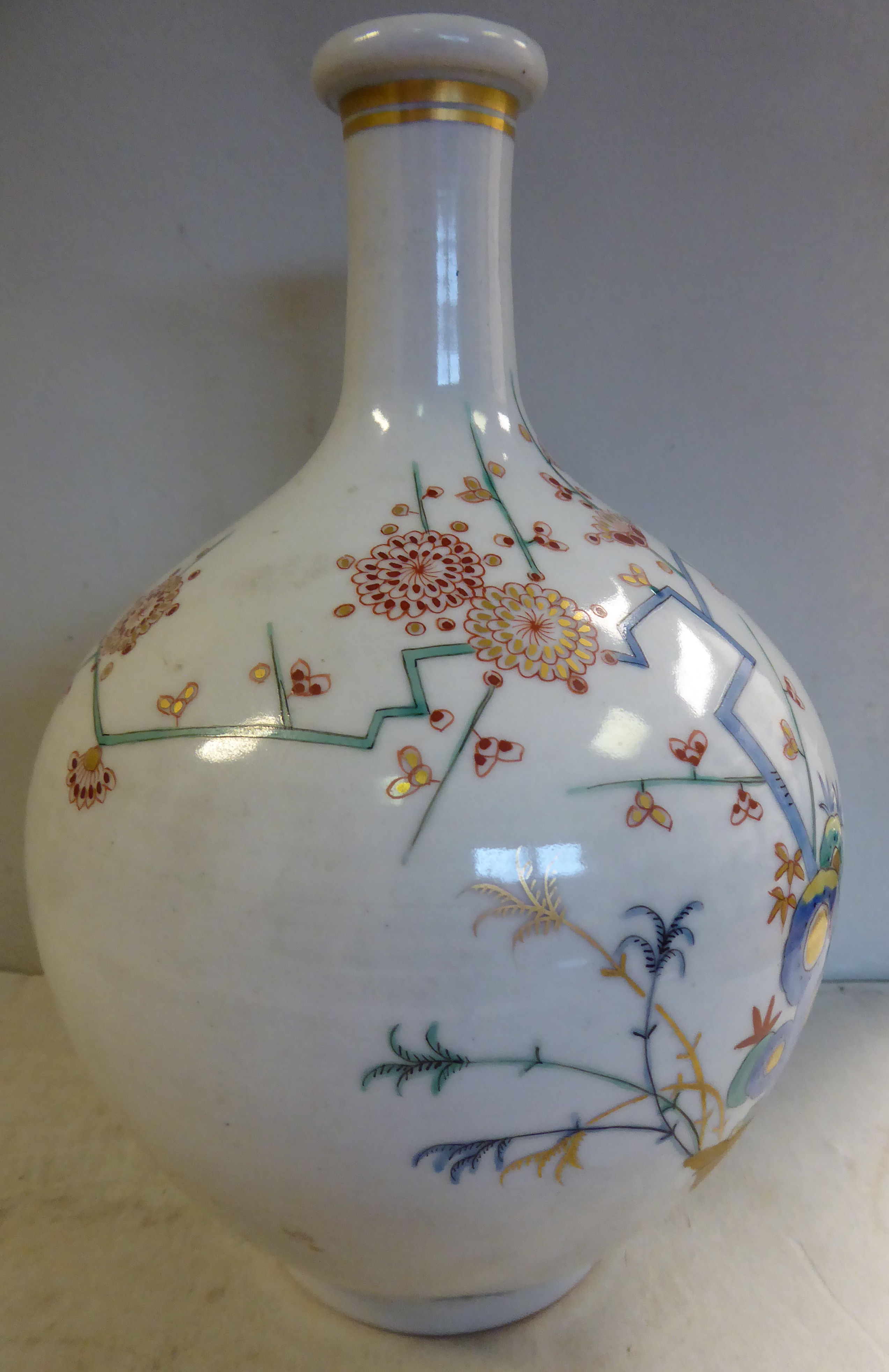 A late 19th/early 20thC Japanese porcelain bottle vase of ovoid form, the short, - Image 4 of 6