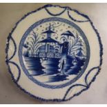 A late 18thC English Pearlware plate, decorated in blue and white,