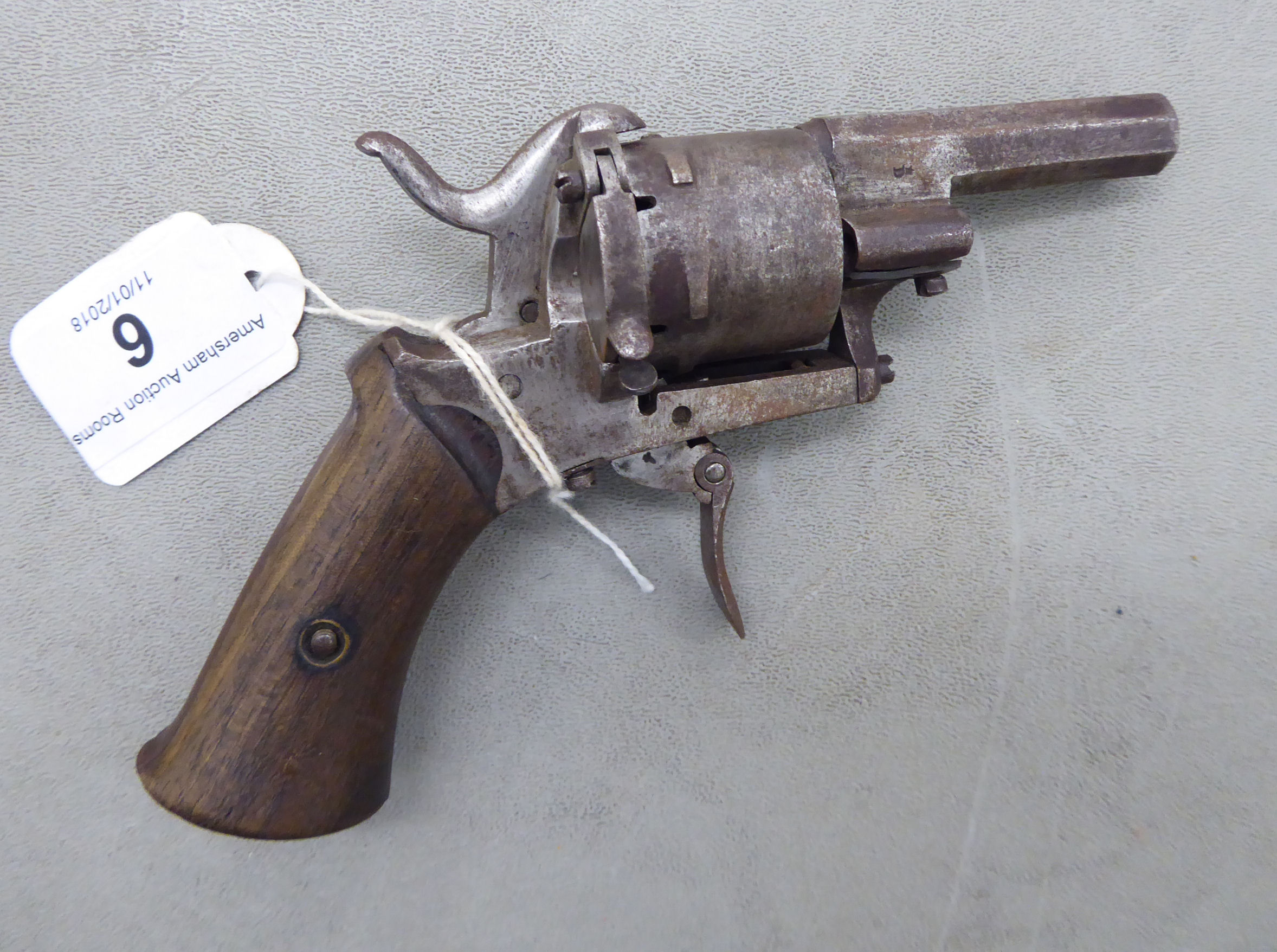 A small pinfire revolver with an octagonal barrel,