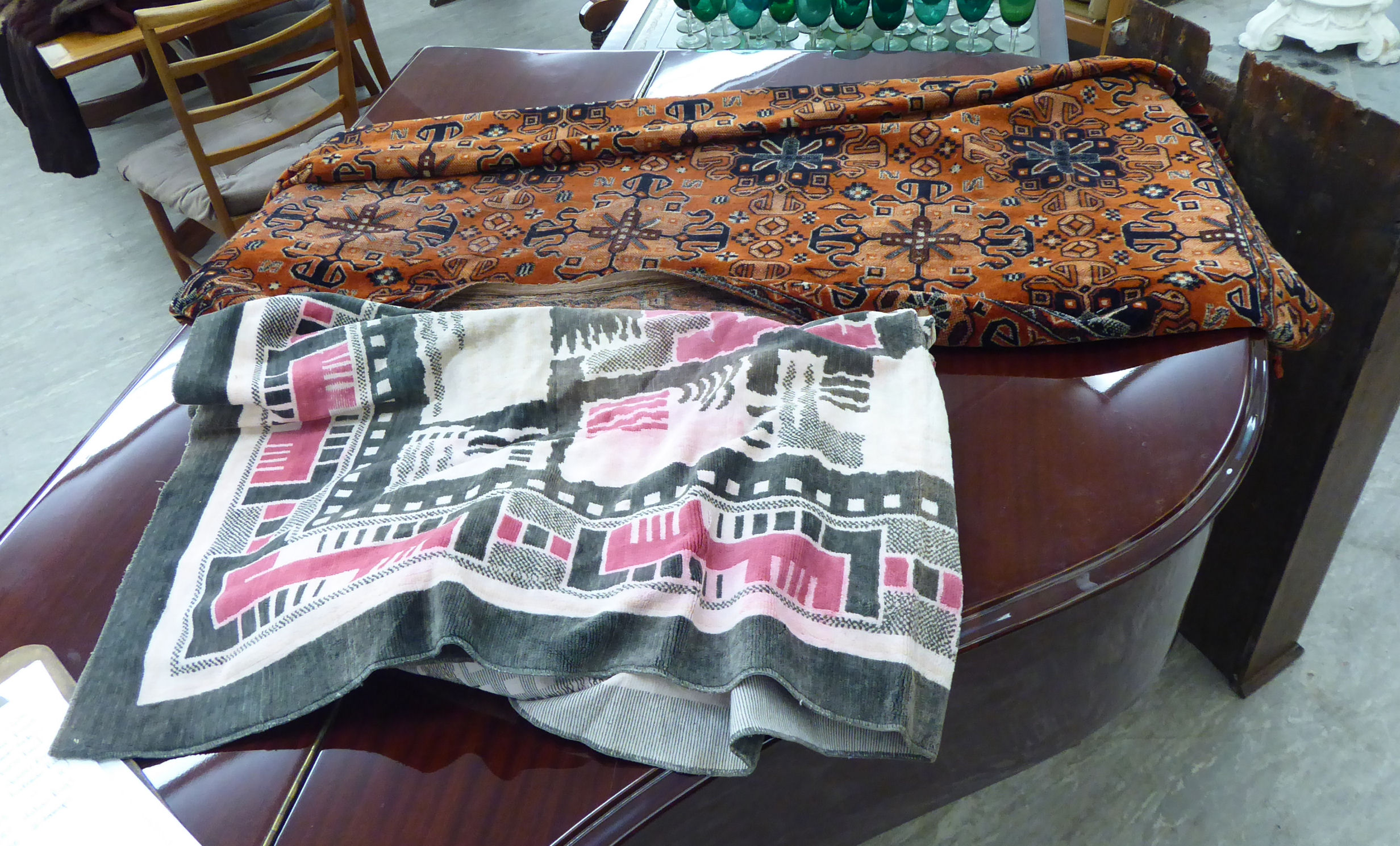 A 1920s Dutch machine made fabric table cloth; and a similar 1930s American example,